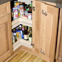 Lazy susan with articulating door